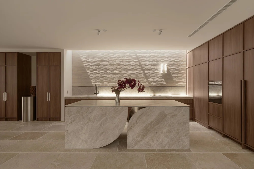 The sculptural stone kitchen island at ZOEI, a Gold Coast photoshoot location.