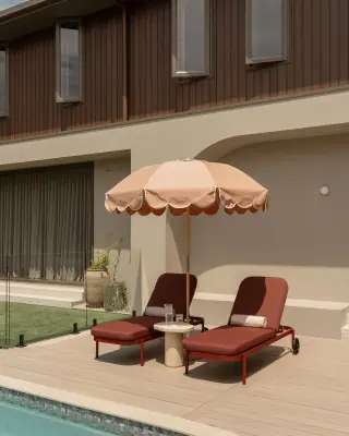 ZOEI on Instagram: poolside loungers under a scalloped umbrella.