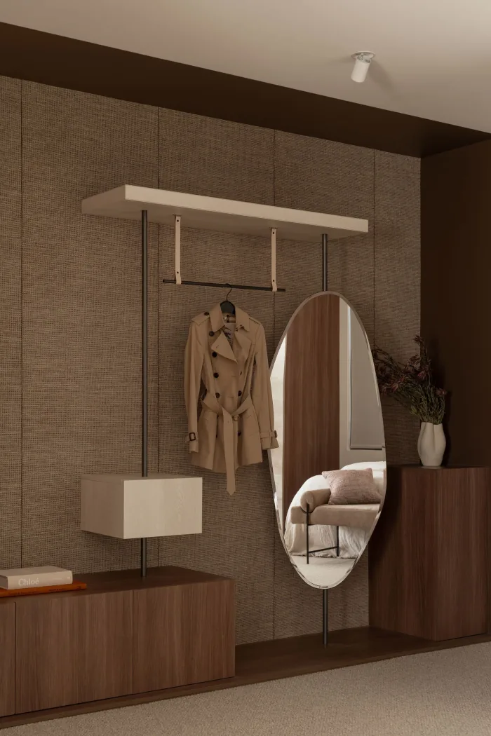 The dressing area at ZOEI with a full length mirror and hanging rail.